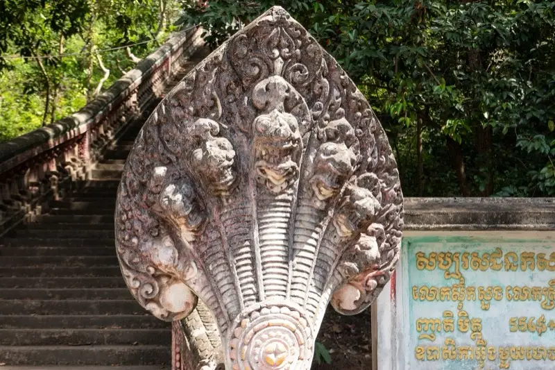 Naga staircase up to a cave temple in Kampot province